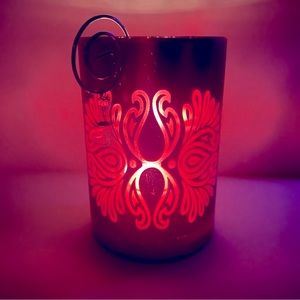 Decorative metallic pink candle holder
